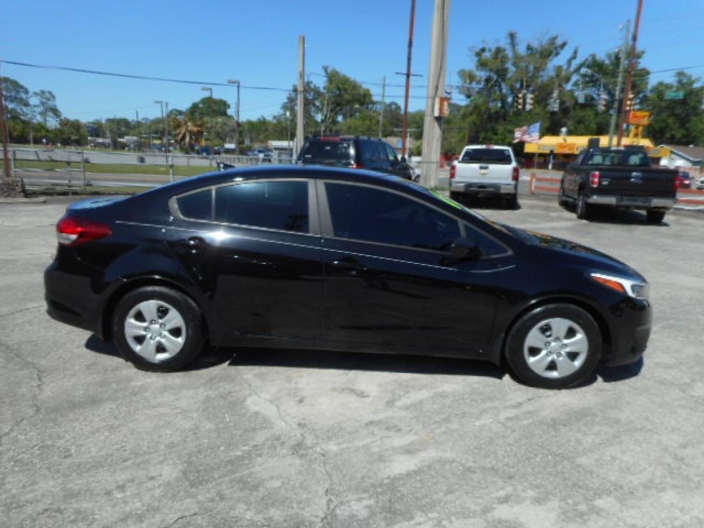 2017 BLACK KIA FORTE LX (3KPFK4A79HE) , located at 10405 Abercorn Street, Savannah, GA, 31419, (912) 921-8965, 31.988262, -81.131760 - Photo#4